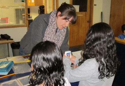 JV AmeriCorps Member Julia Krolikowski helps with an art project at the YMCA 