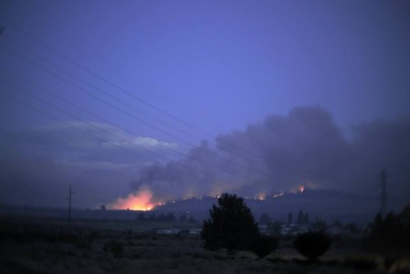 Fires burn at dusk near Omak
