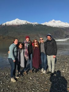 Six people in from of the Mendenhall Glacier