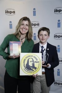 mother and son with awards