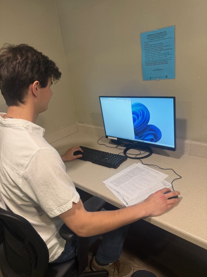 man working at a computer
